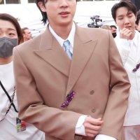 BTS' Jin Went Viral During The GRAMMYs For The Fourth Consecutive Year, 2022 He Was "light brown suit guy" and "the guy in cast"